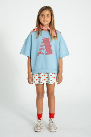 short skirt | light blue w/ red hearts